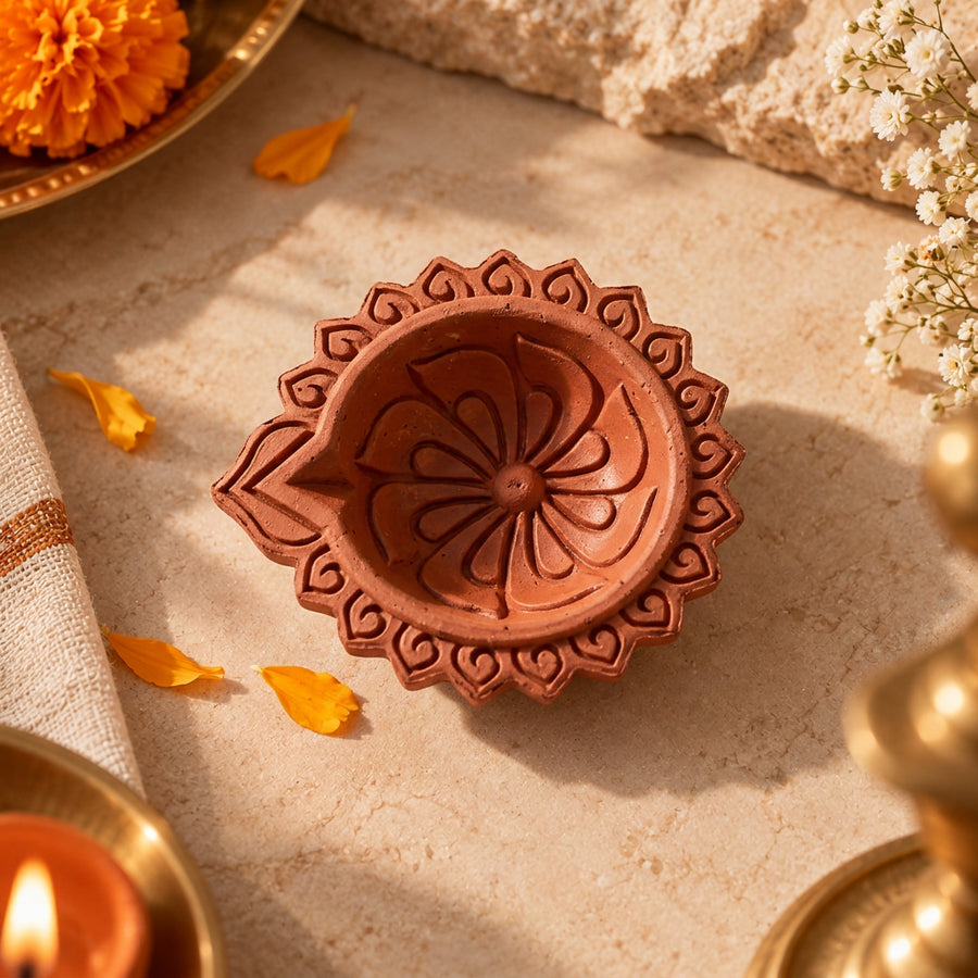 Chakri hand-carved terracotta diya